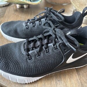 Nike women’s Black and White volleyball Sneakers